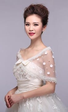 Изысканное платье невесты с жемчугом